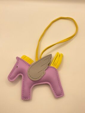 NWOT Lavender Winged Horse Bag Charm with Yellow Tassel